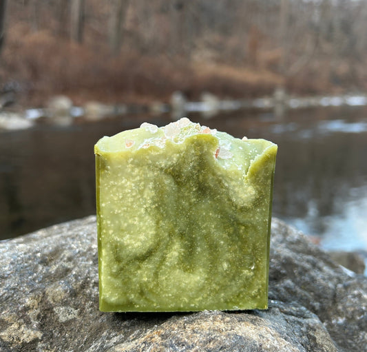 Handmade eucalyptus and pink salt soap bar enriched with nourishing organic coconut oil, olive oil, shea butter, and mango seed butter. Naturally colored with spinach powder and infused with pink salt for gentle exfoliation. Scented with eucalyptus essential oil for a refreshing and invigorating cleanse. Each bar weighs approximately 3 ounces and is wrapped in eco-friendly lokta paper.